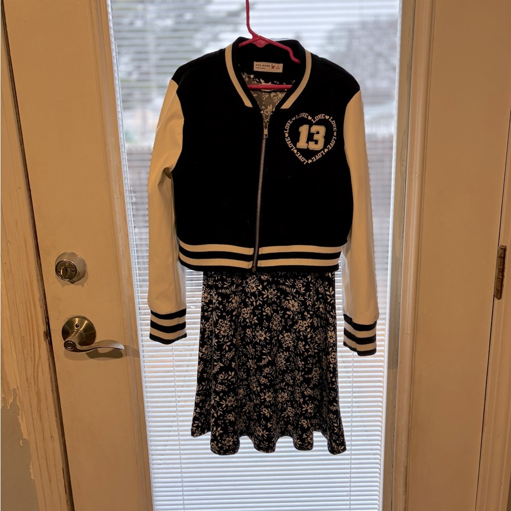 Black and White Varsity Jacket with Floral Dress
Wore once. Perfect condition